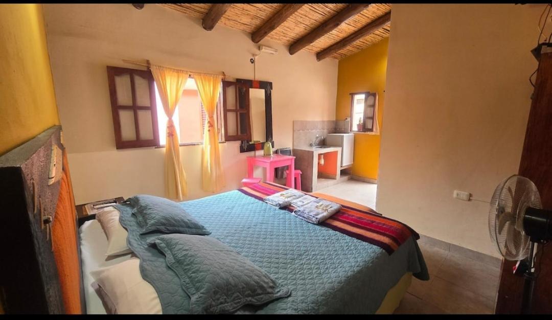 Hostal Paseo De Los Colorados Пурмамарка Номер фото